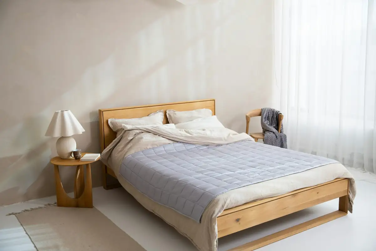 bedroom-bed-by-window.webp