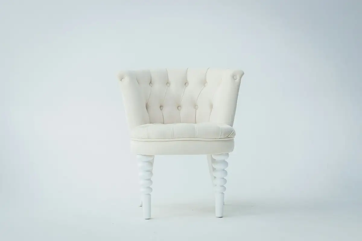 tufted-beige-armchair.webp